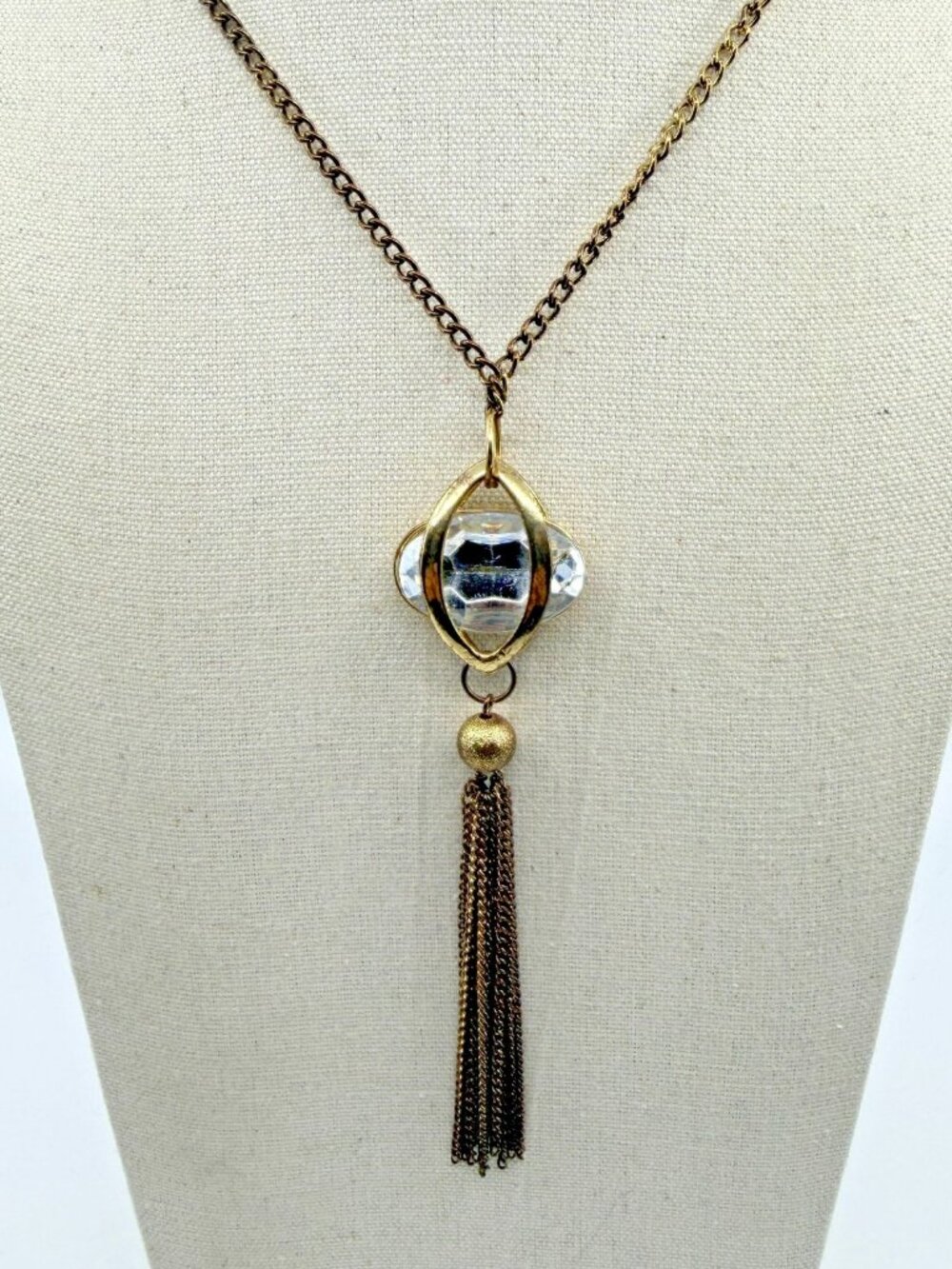 Gold Tone Crystal Cage Pendant Necklace with Tassel Charm